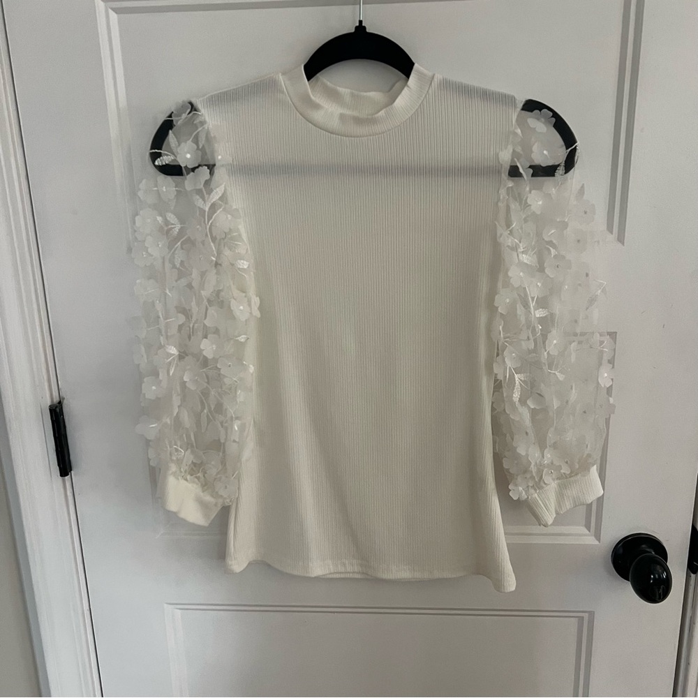 Elegant White Top with Floral Sleeves